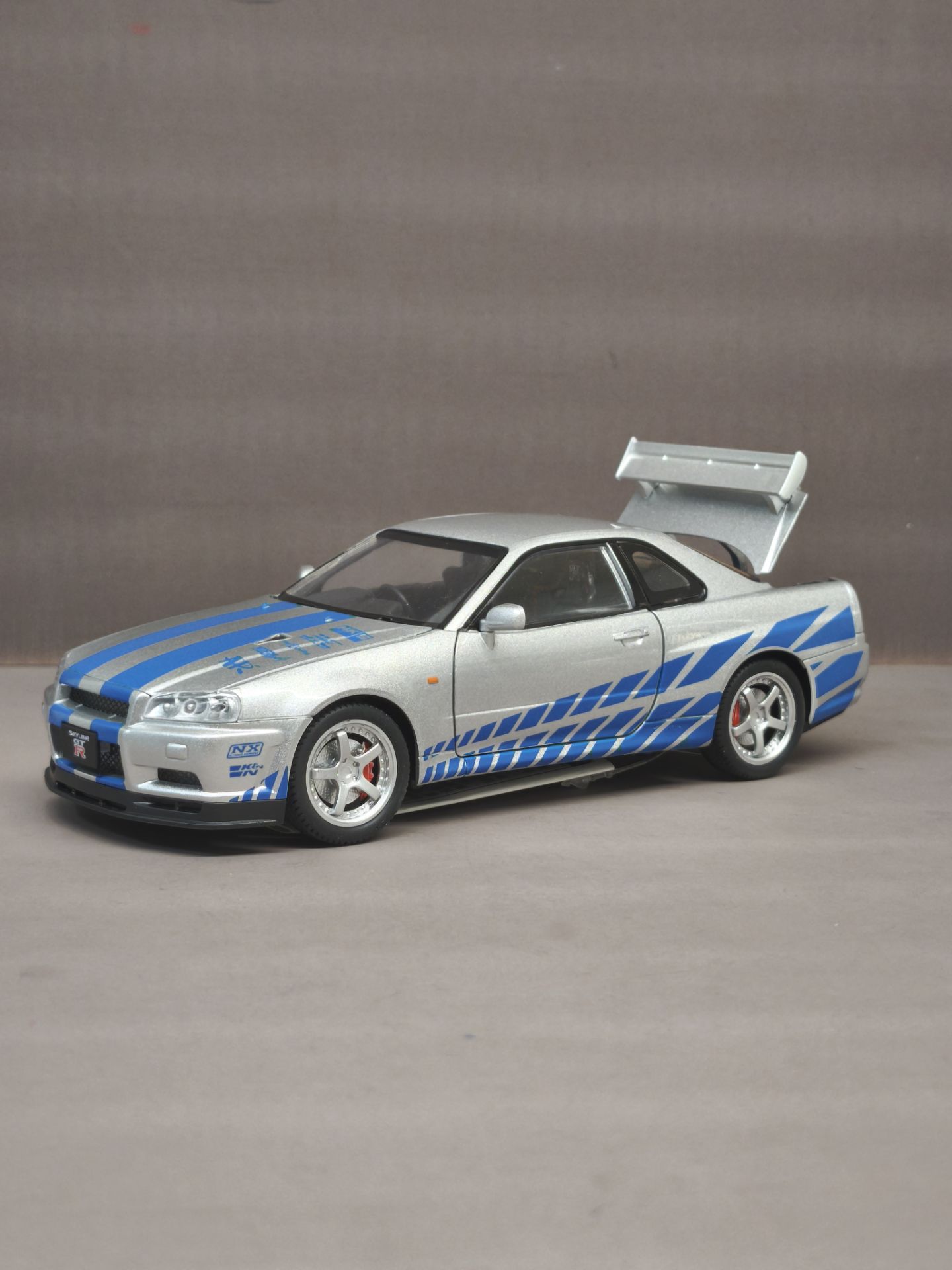 ماشین فلزی نیسان جی تی ار اسکالاین ار۳۴ nissan r34 skyline 13 ماشین فلزی نیسان جی تی ار اسکالاین ار۳۴ nissan r34 skyline - Image 10