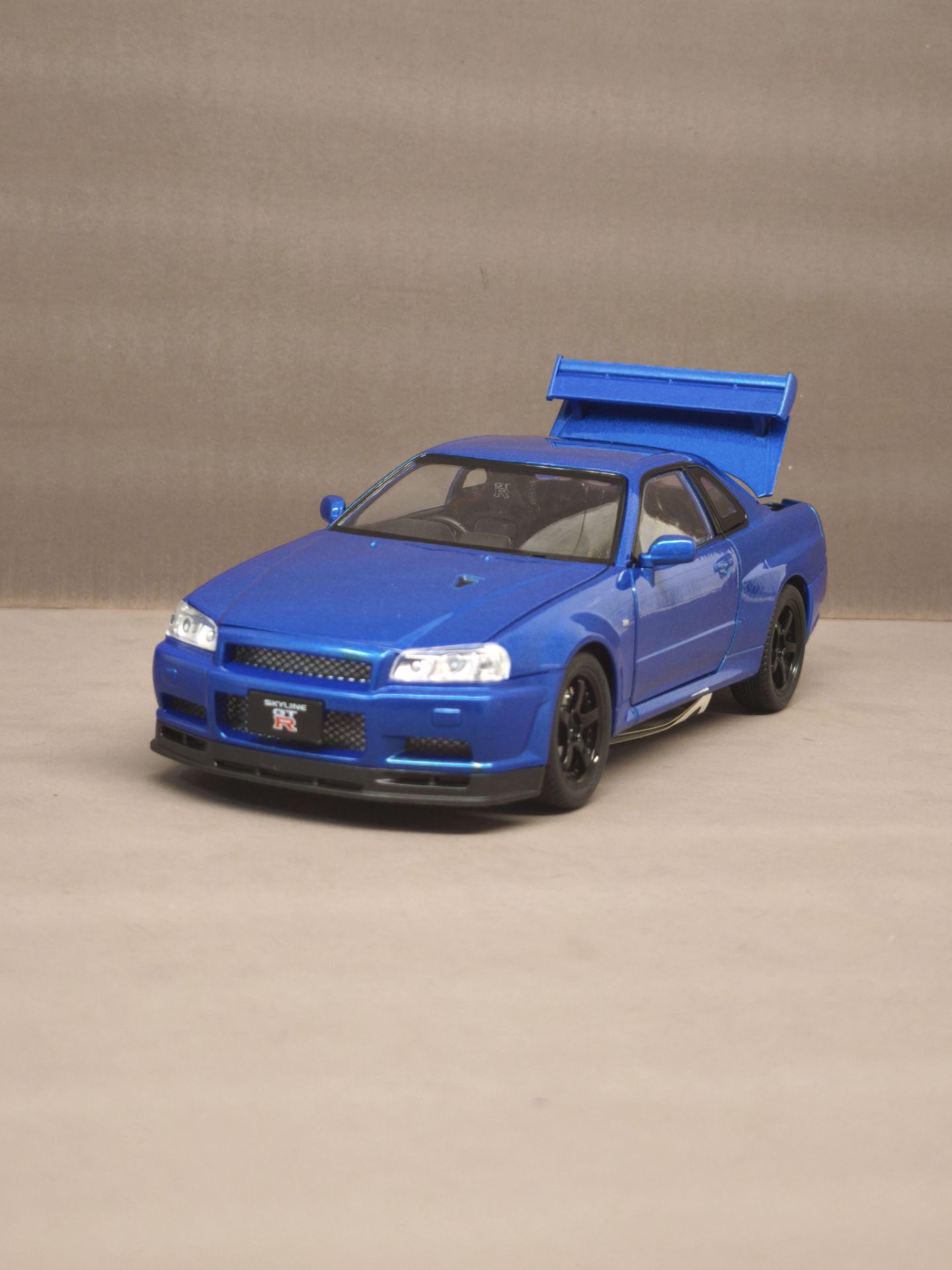 ماشین فلزی نیسان جی تی ار اسکالاین ار۳۴ nissan r34 skyline 16 ماشین فلزی نیسان جی تی ار اسکالاین ار۳۴ nissan r34 skyline - Image 13